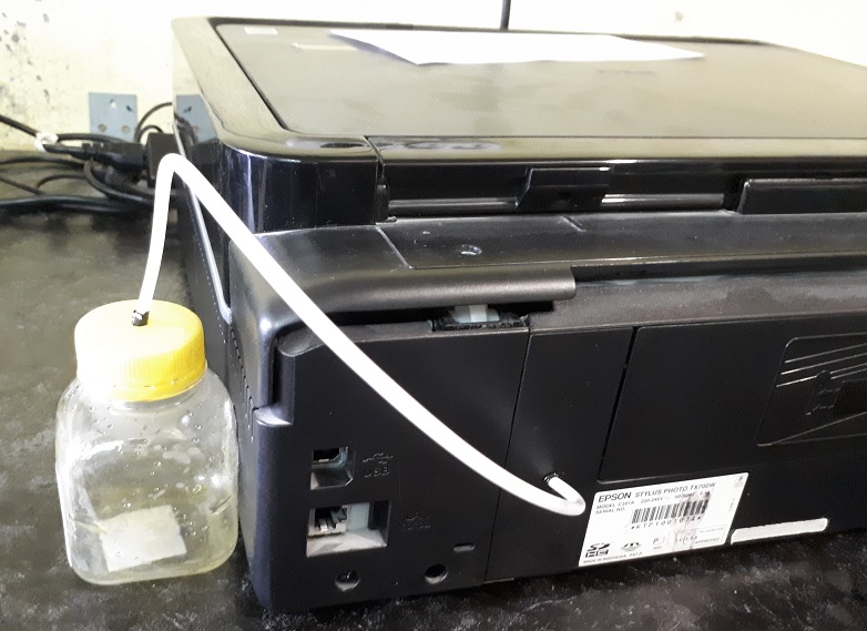 вывод отработанных чернил